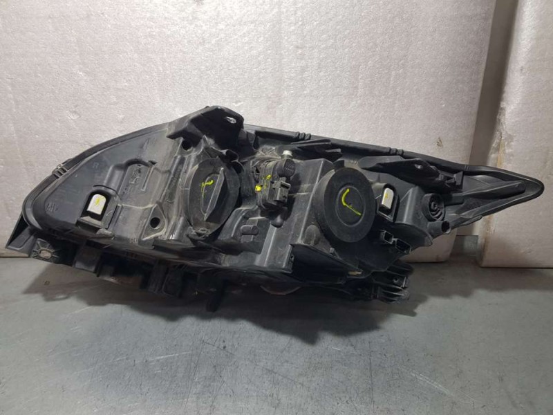 Recambio de faro derecho para renault laguna iii dynamique tomtom referencia OEM IAM 260100038R  RAYADO , PATA TOCADA