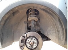 PLASTICO PASE RUEDA DEL. IZQ. YQ00353280 