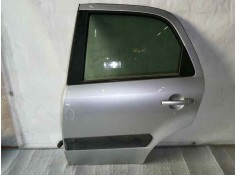 PUERTA TRASERA IZQUIERDA TOCADA