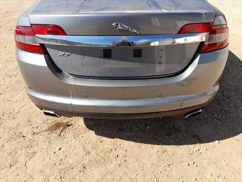 Recambio de paragolpes trasero para jaguar xf i (x250) 2.7 d referencia OEM IAM C2Z2148XXX ROZADO 