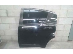 PUERTA TRASERA IZQUIERDA TOCADA