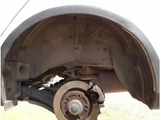 PLASTICO PASE RUEDA TRAS. IZQ. 767492968R 