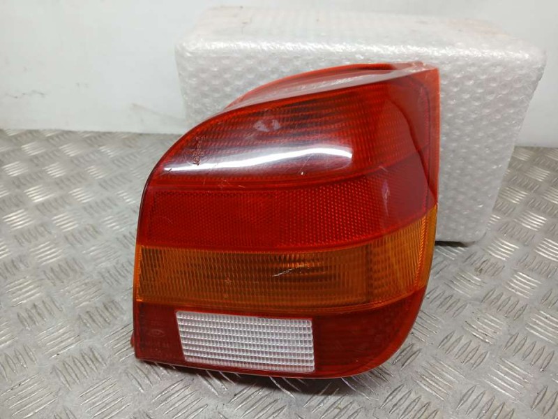 Recambio de piloto trasero derecho para ford fiesta berl./courier si referencia OEM IAM 89BG13N004  ROZADO