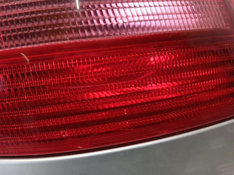 Recambio de piloto trasero izquierdo para audi a4 berlina (b5) 1.8 referencia OEM IAM 8D0945111D  ROZADO