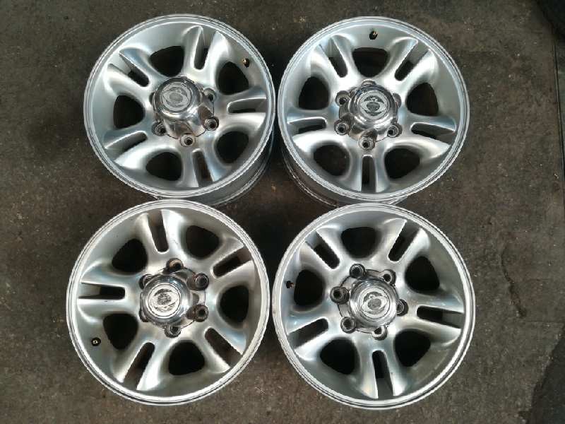 Recambio de juego llantas aluminio para ssangyong korando 2.9 tdi referencia OEM IAM  ALUMINIO 7X16 ET22 6TORN ROZADAS