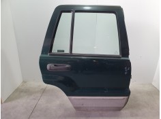 PUERTA TRASERA DERECHA TOCADO