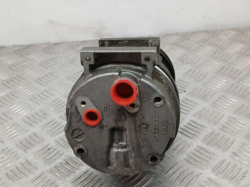 Recambio de compresor aire acondicionado para renault megane i fase 2 classic (la..) 1.9 dci dynamique referencia OEM IAM 770010