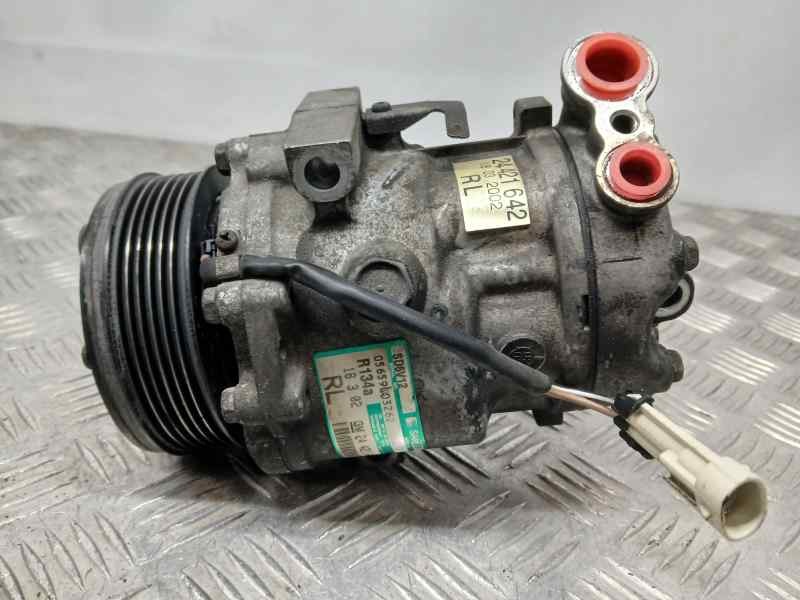 Recambio de compresor aire acondicionado para opel combo (corsa c) tour referencia OEM IAM 24421642 SD6V12 SANDEN