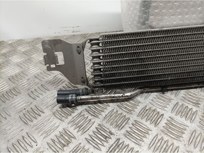 Recambio de radiador aceite para opel astra j lim. cosmo referencia OEM IAM 52432861  