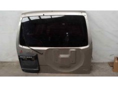 PORTON TRASERO TOCADO