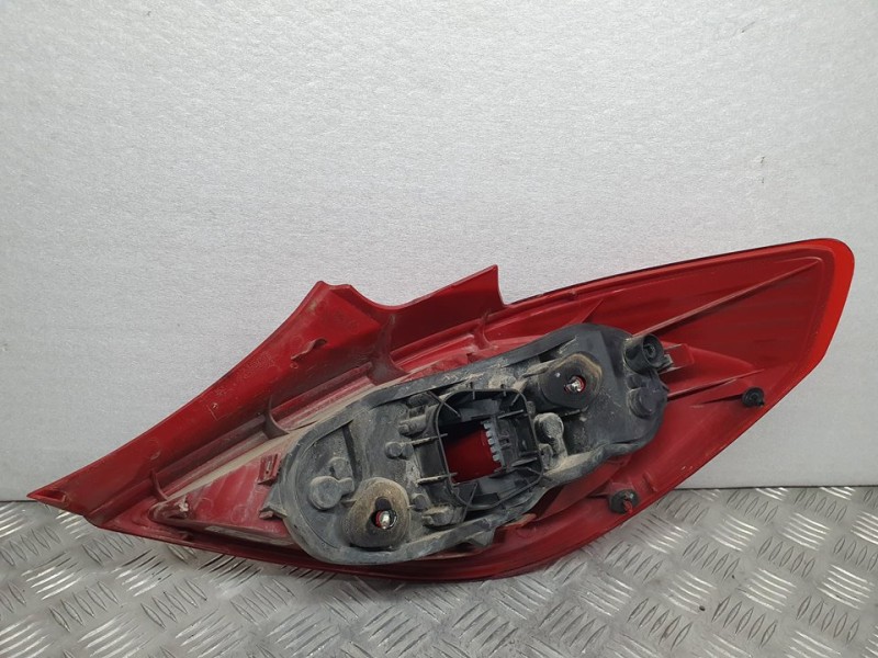 Recambio de piloto trasero izquierdo para opel corsa d cosmo referencia OEM IAM 13186350 89038960A VALEO