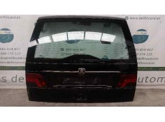 PORTON TRASERO TOCADO