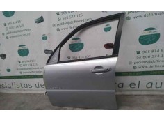 PUERTA DELANTERA IZQUIERDA TOCADA