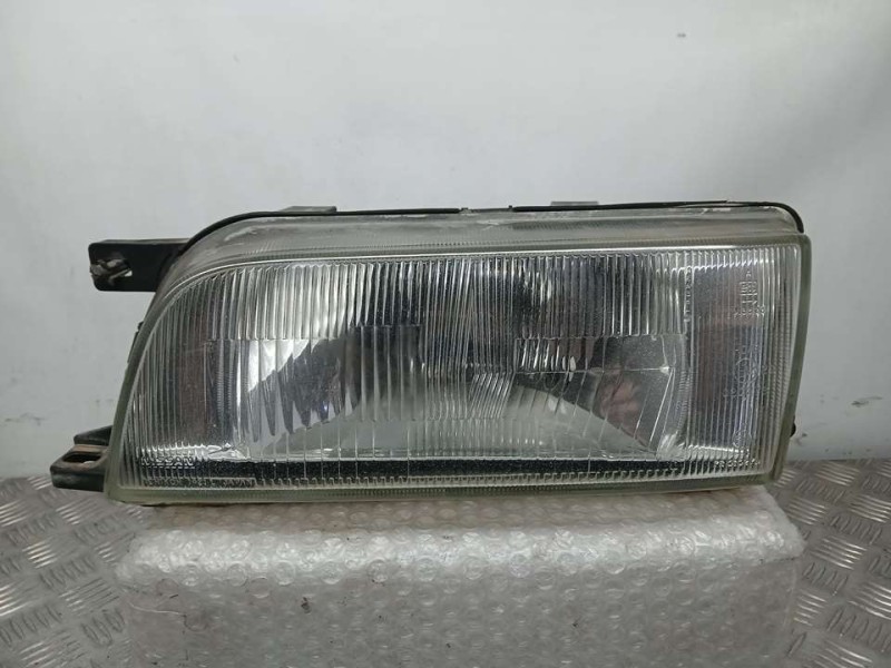 Recambio de faro izquierdo para nissan sunny berlina (n14) lx referencia OEM IAM B606063C00  