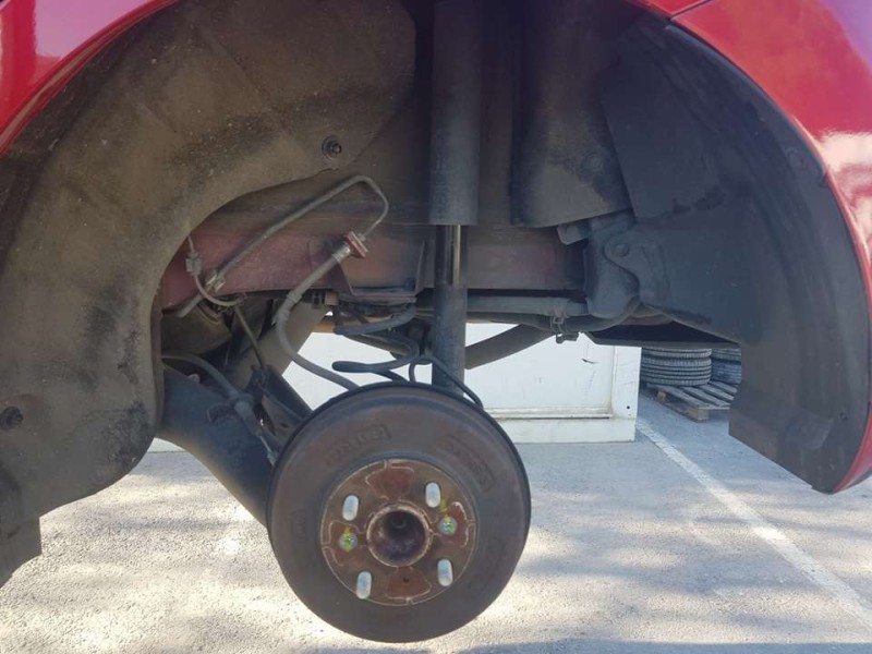 Recambio de plastico pase rueda tras. izq. para mazda 2 lim. () origin referencia OEM IAM   