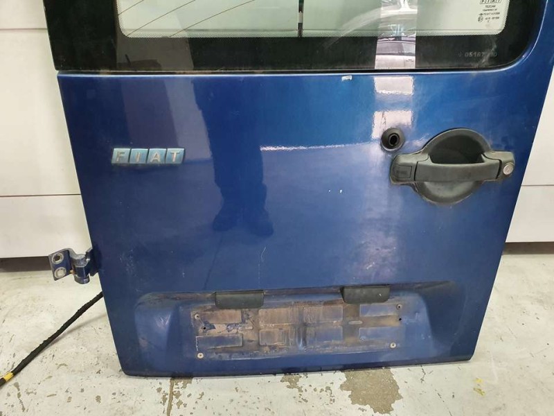 Recambio de puerta trasera izquierda carga para fiat doblo cargo (223) 1.9 d sx furg. acristalado referencia OEM IAM 51766902  T