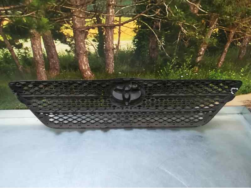 Recambio de rejilla delantera para toyota corolla (e12) 1.6 terra berlina referencia OEM IAM 5311102160  3 PATAS ROTAS