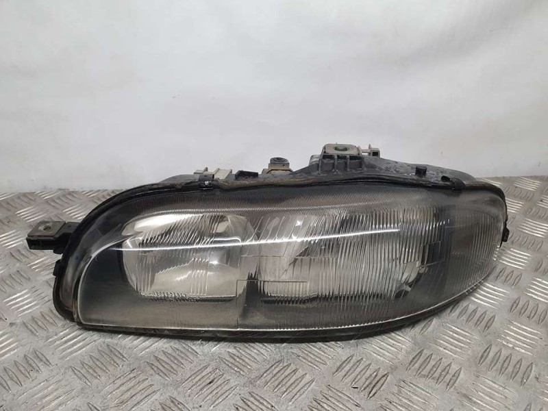 Recambio de faro izquierdo para fiat bravo (182) jtd 105 / 100 trofeo referencia OEM IAM SIN REF  