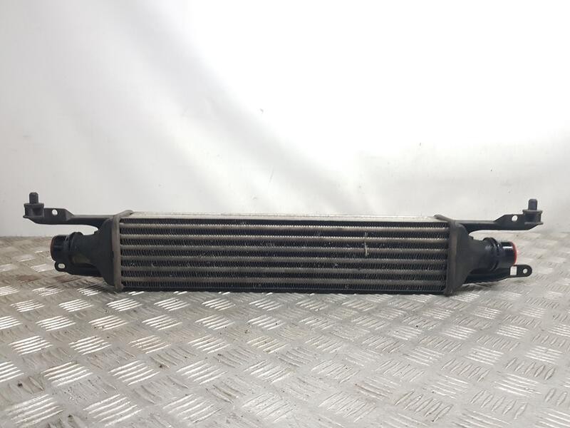 Recambio de intercooler para opel corsa d 111 years referencia OEM IAM 55702194  