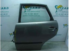 PUERTA TRASERA IZQUIERDA TOCADA