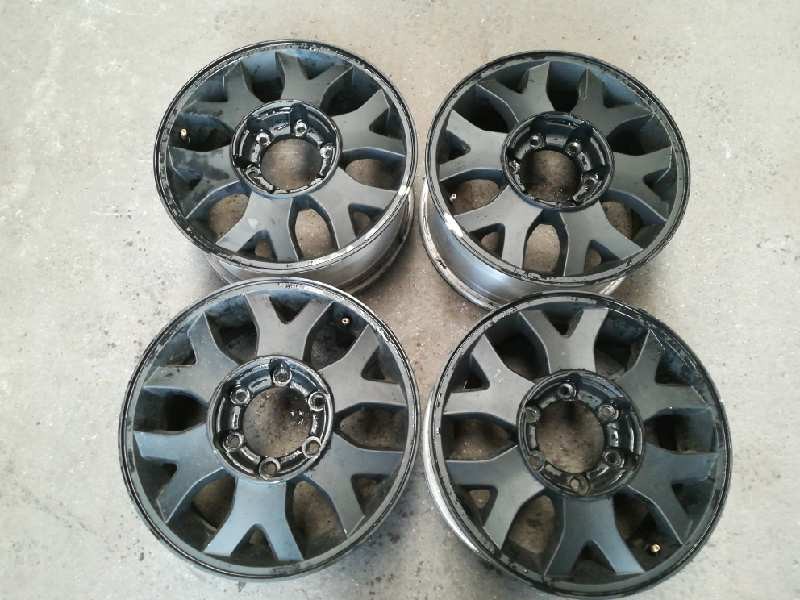 Recambio de juego llantas aluminio para ssangyong rexton rx 270 plus / 270 xdi plus referencia OEM IAM  ALUMINIO 7X16 6 TORN ROZ