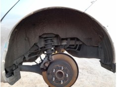 PLASTICO PASE RUEDA TRAS. IZQ. 6563847010 