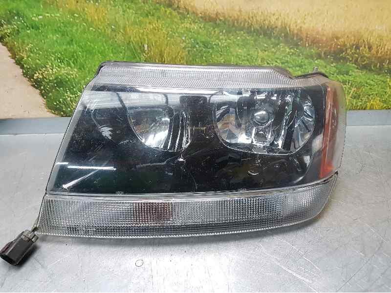 Recambio de faro izquierdo para jeep gr.cherokee (wj/wg) 2.7 crd limited referencia OEM IAM   LLEVA UNA GRIETA POR DETRAS