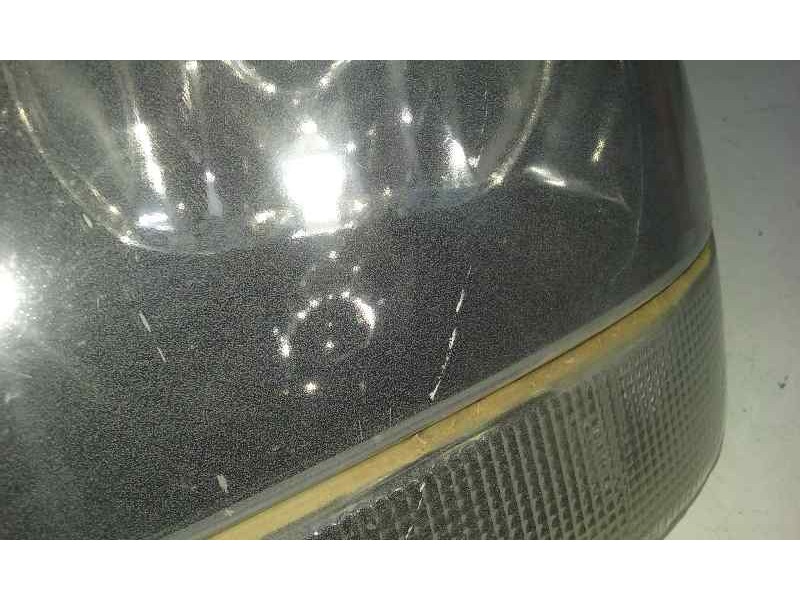 Recambio de faro izquierdo para jeep gr.cherokee (wj/wg) 3.1 td laredo referencia OEM IAM   TOCADO