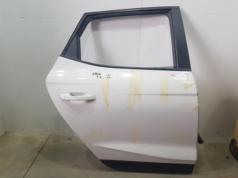 Recambio de puerta trasera derecha para seat arona style edition referencia OEM IAM 6F9833052E  TOCADA