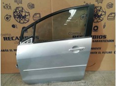 PUERTA DELANTERA IZQUIERDA TOCADA