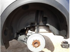 PLASTICO PASE RUEDA TRAS. IZQ. 767493736R 