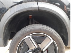 PLASTICO PASE RUEDA TRAS. DCH. 