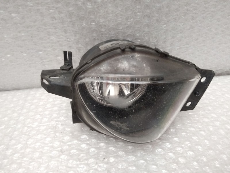 Recambio de faro antiniebla izquierdo para bmw serie 3 touring (e91) 320d referencia OEM IAM 6948373 6310100000 