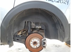 PLASTICO PASE RUEDA TRAS. IZQ. 