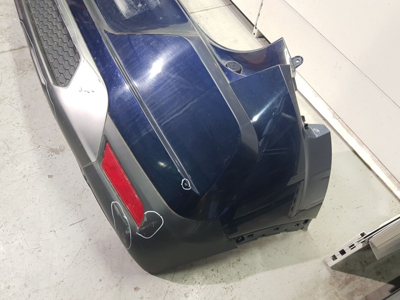 Recambio de paragolpes trasero para ssangyong tivoli 1.5 referencia OEM IAM  ROZADO 