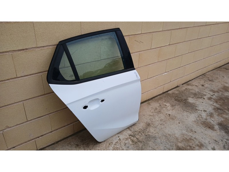 Recambio de puerta trasera izquierda para opel corsa f gs referencia OEM IAM   DOBLADA