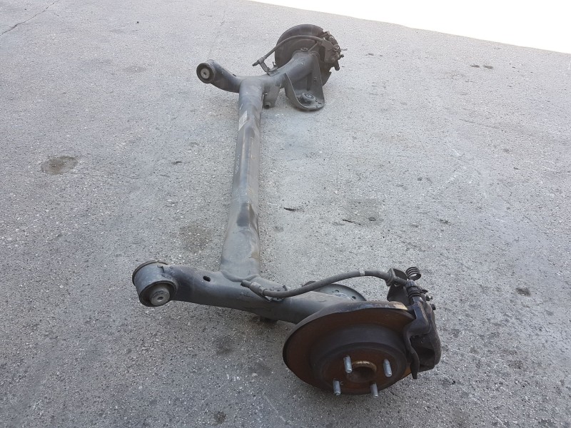 Recambio de puente trasero para kia rio iii (ub) 1.2 cvvt referencia OEM IAM 551001W610 DISCO C/ABS Y 4 TORNILLOS 