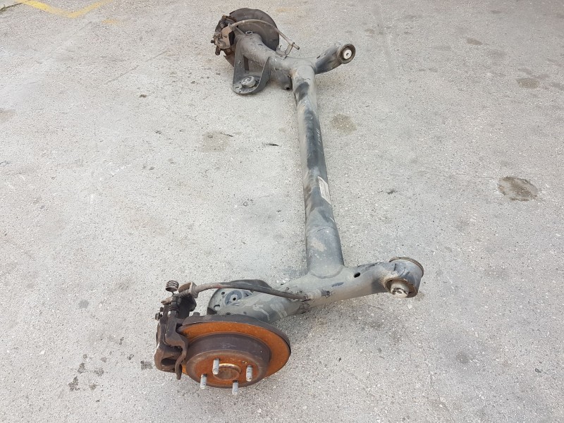 Recambio de puente trasero para kia rio iii (ub) 1.2 cvvt referencia OEM IAM 551001W610 DISCO C/ABS Y 4 TORNILLOS 