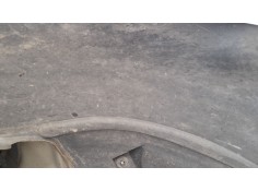 PLASTICO PASE RUEDA DEL. IZQ. 52128360 