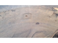 PLASTICO PASE RUEDA DEL. IZQ. 63841JG30B 