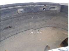 PLASTICO PASE RUEDA DEL. IZQ. 9676736980 