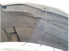 PLASTICO PASE RUEDA TRAS. IZQ. 767499U00A 