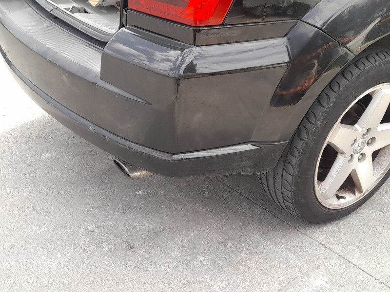 Recambio de paragolpes trasero para dodge caliber 2.0 crd referencia OEM IAM 1CJ60TZZAG TOCADO 