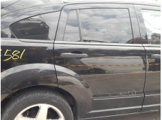 PUERTA TRASERA DERECHA 04589887AD TOCADA 