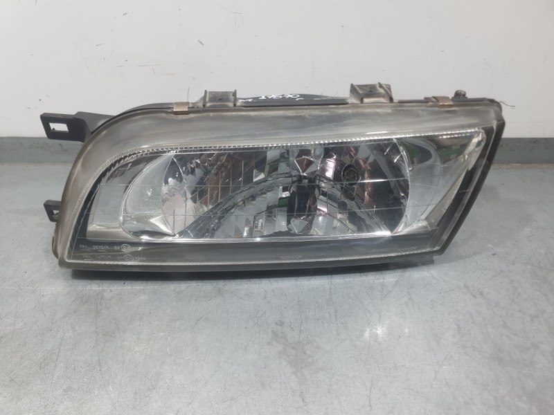 Recambio de faro izquierdo para nissan almera i (n15) 1.4 referencia OEM IAM 260651N711 260601N726 