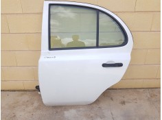 PUERTA TRASERA IZQUIERDA 82101AX130 TOCADA 