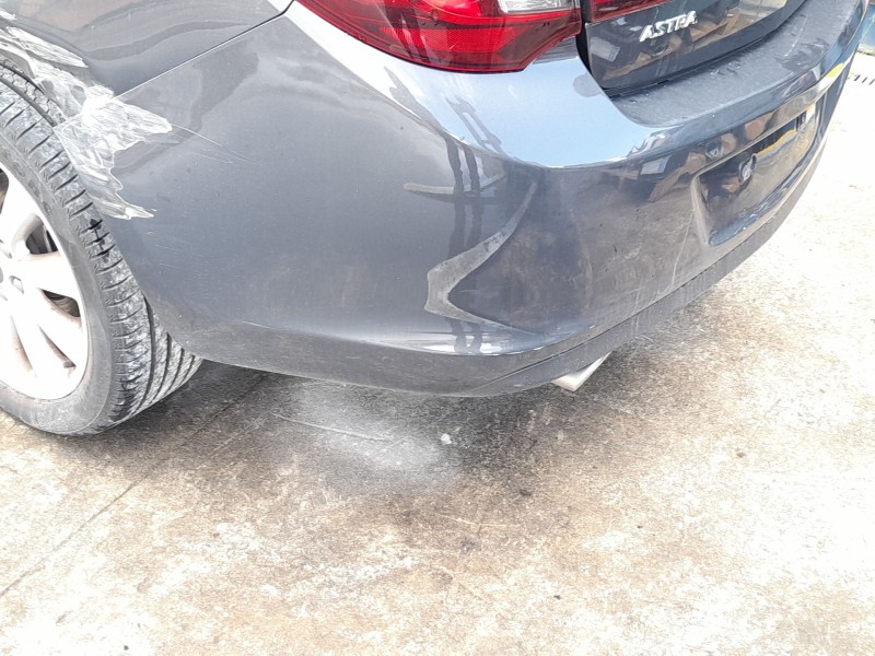 Recambio de paragolpes trasero para opel astra j sedán 1.4 turbo (69) referencia OEM IAM 20877796  