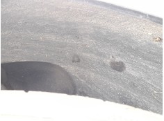 PLASTICO PASE RUEDA DEL. IZQ. 6P0809957 