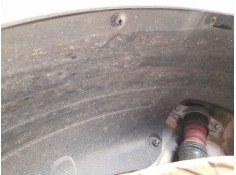 PLASTICO PASE RUEDA TRAS. DCH. 
