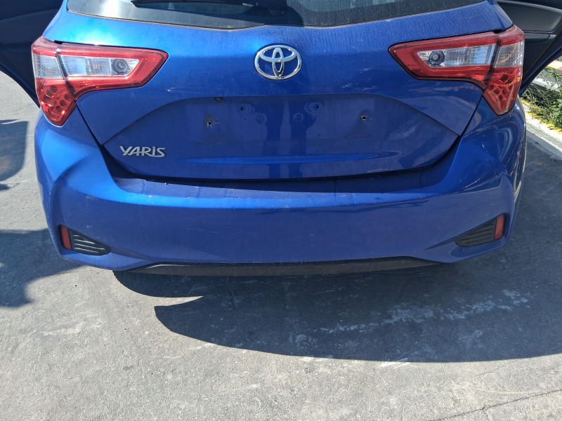 Recambio de paragolpes trasero para toyota yaris (_p13_) 1.5 (nsp131_) referencia OEM IAM 52159K0906 ROZADO 